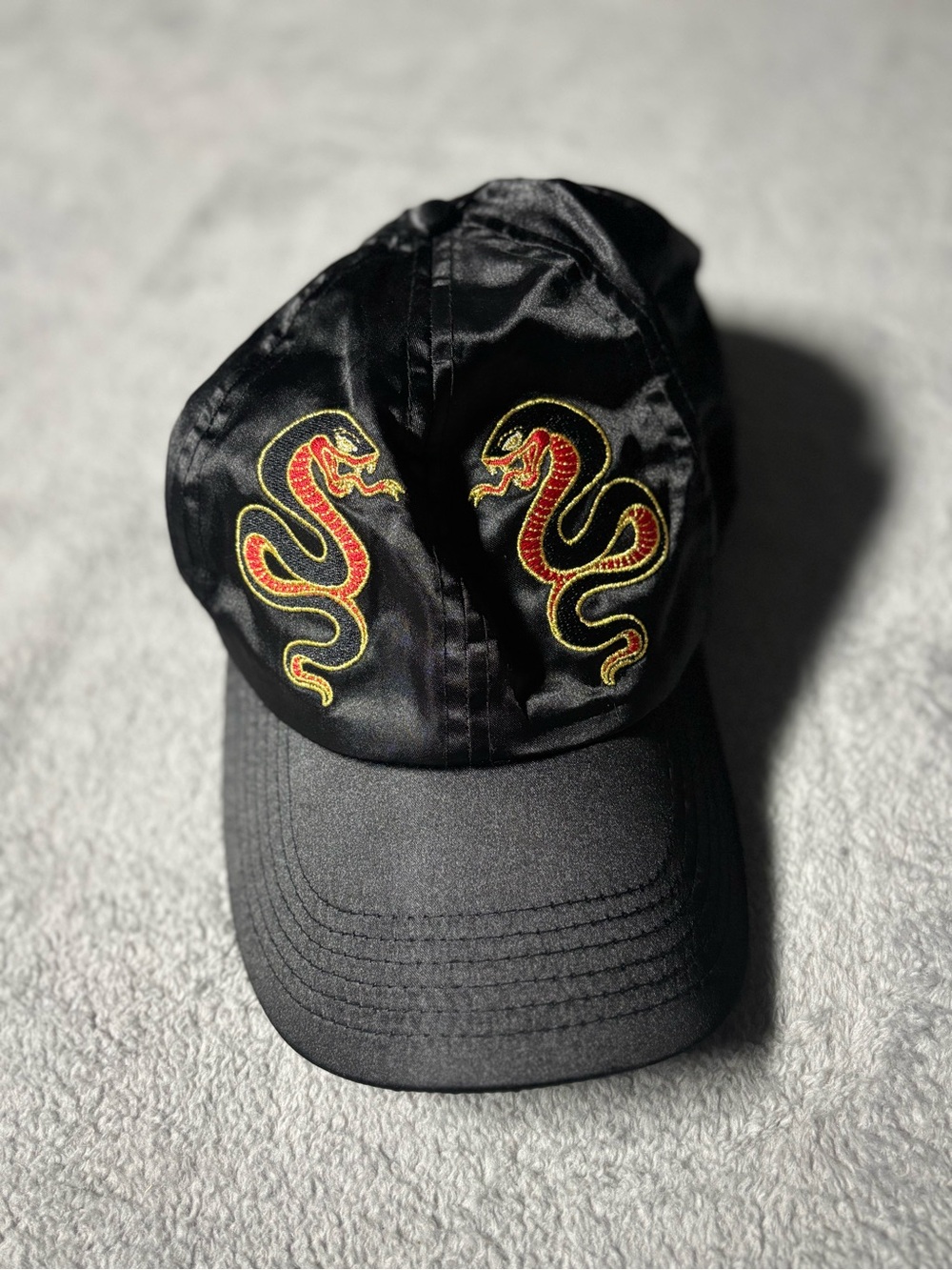 Black H&M Satin Cap with Red & Gold Embroidered Snake Design